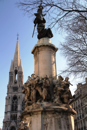 Church tower and war monument at the upper end of La Canbiere.
