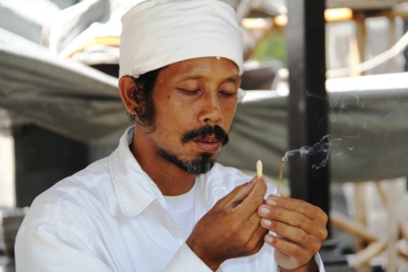Temple worship with incense.