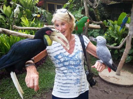 With feathered friends. 